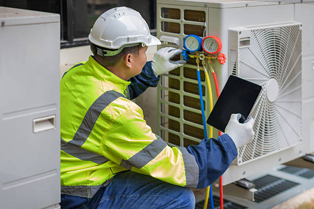 Professional Heat Pump Repair technician working in Wellesley, MA